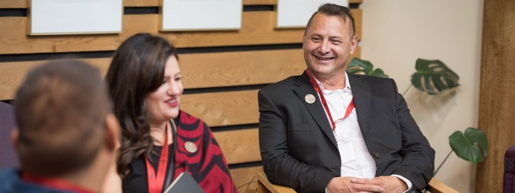 Image of student James Hobart sitting with other students