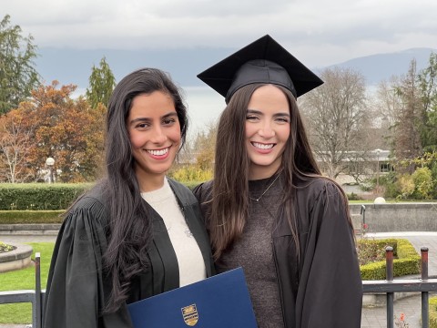 DFN team members Simran Panatch (left) and Jade Greer (right) at their UBC Sauder graduation